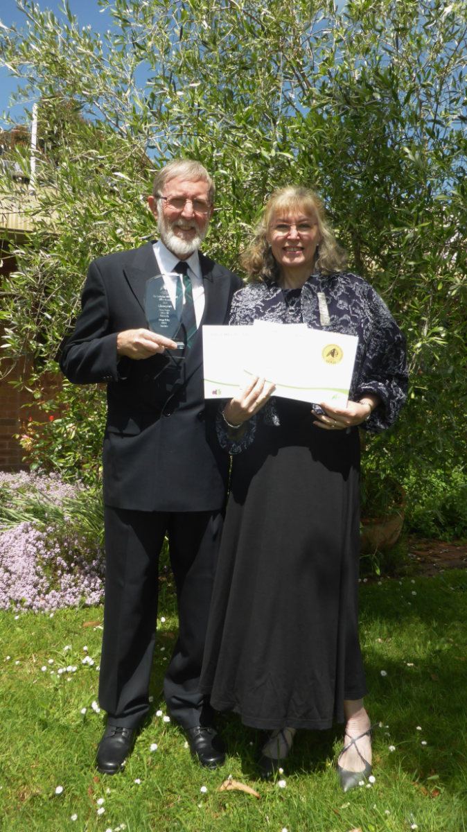 Chris and Andrea McCallum with their 2022 olive award